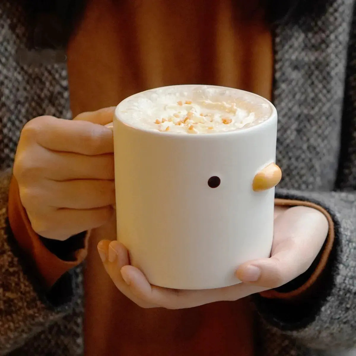 Taza de café con forma de pollito