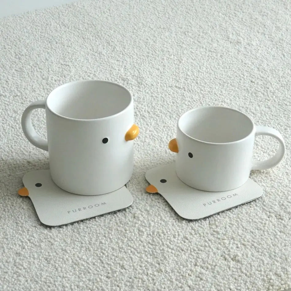 Taza de café con forma de pollito