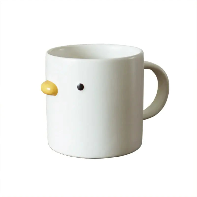 Taza de café con forma de pollito