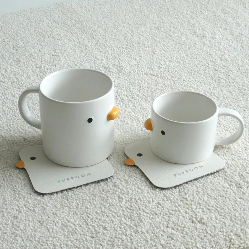 Taza de café con forma de pollito