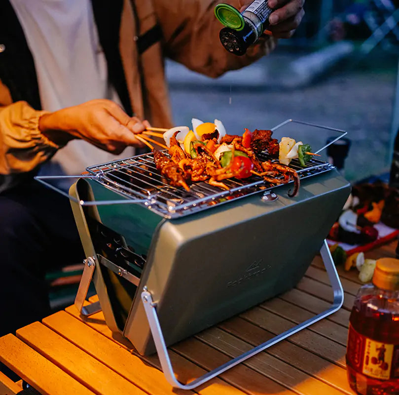 Parrilla de acero inoxidable plegable para acampar, portátil, para cocinar al carbón