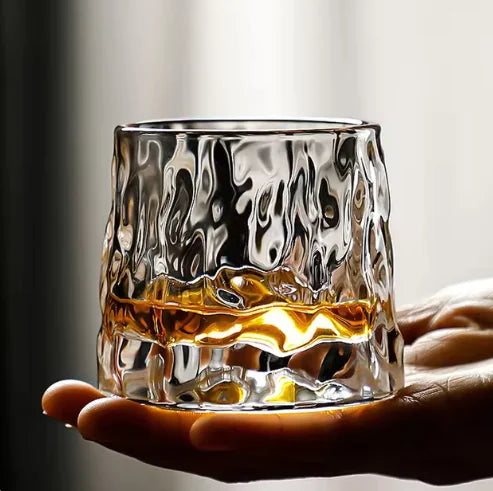 Vaso de whisky de cristal giratorio nórdico